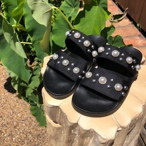 Steve Madden black slides with pearls.